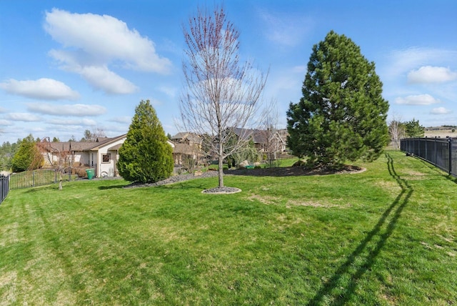view of yard with fence