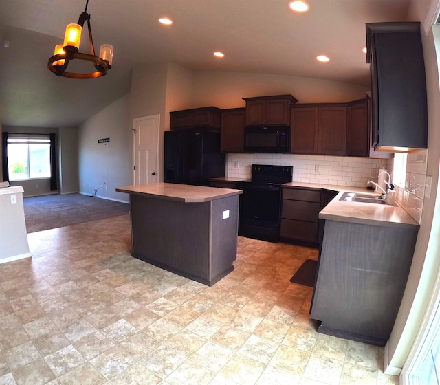 1217 S Greenacres Rd, Greenacres, WA 99016 - kitchen with black appliances, lofted ceiling, a kitchen island, tasteful backsplash, and open floor plan