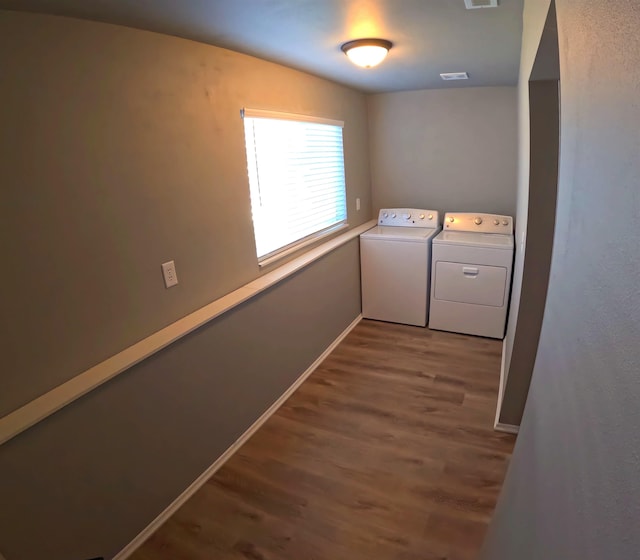 1217 S Greenacres Rd, Greenacres, WA 99016 - laundry area with washer and dryer and wood finished floors