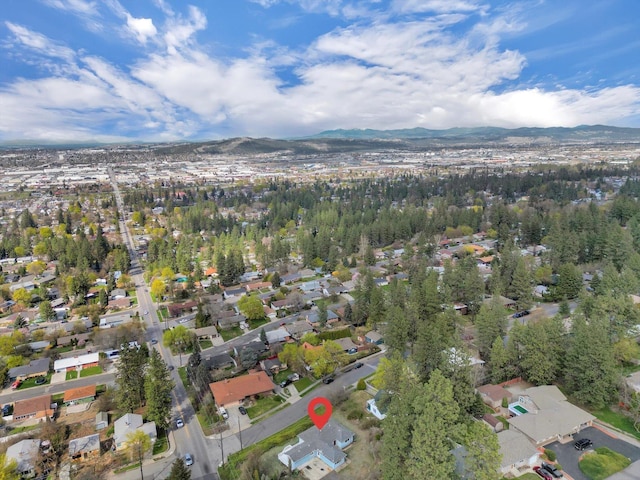 drone / aerial view with a mountain view and a residential view