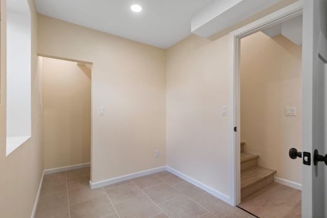 703 E Kiernan Ave, Spokane, WA 99207 - unfurnished room with recessed lighting, stairs, baseboards, and light tile patterned floors
