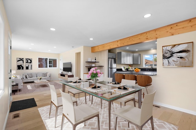 703 E Kiernan Ave, Spokane, WA 99207 - dining room featuring recessed lighting, light wood-type flooring, visible vents, and baseboards