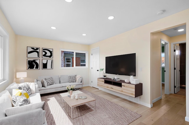 703 E Kiernan Ave, Spokane, WA 99207 - living area with baseboards, light wood-style floors, and recessed lighting