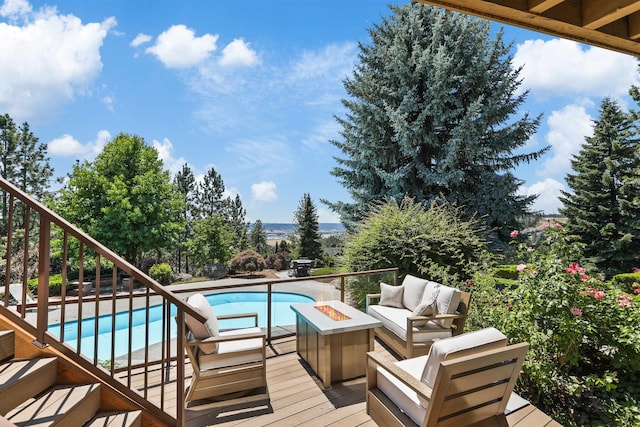 7816 E Gunning Ln, Spokane, WA 99212 - outdoor pool with an outdoor living space with a fire pit and stairs