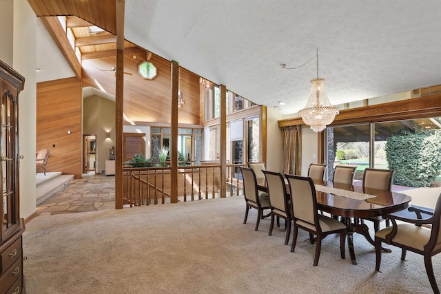 7816 E Gunning Ln, Spokane, WA 99212 - carpeted dining space with a chandelier and a textured ceiling