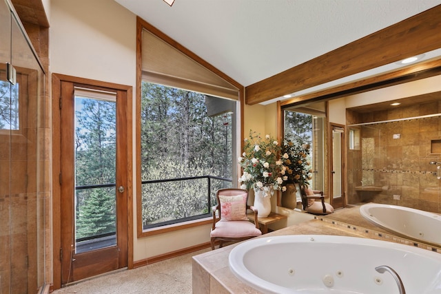 7816 E Gunning Ln, Spokane, WA 99212 - full bath featuring a tub with jets, a stall shower, and lofted ceiling