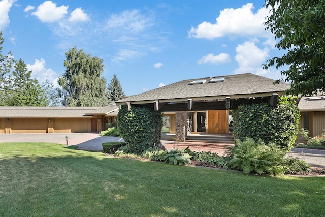 7816 E Gunning Ln, Spokane, WA 99212 - view of front of house with a front yard and a shingled roof