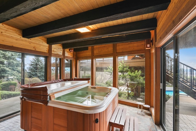 7816 E Gunning Ln, Spokane, WA 99212 - sunroom with a jacuzzi, beam ceiling, and healthy amount of natural light