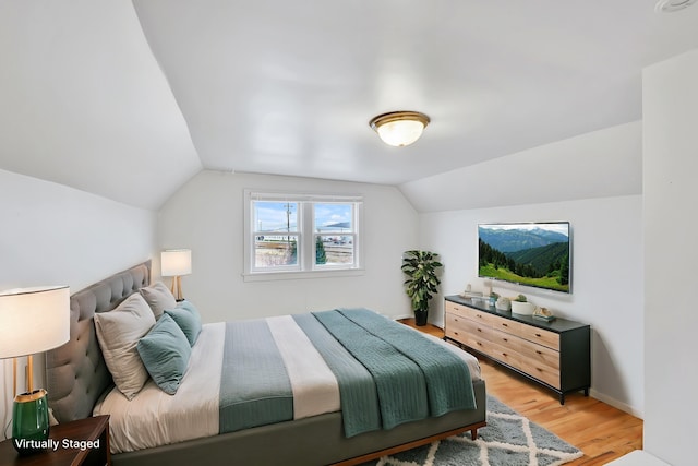 2612 N Elizabeth Rd, Spokane Valley, WA 99212 - bedroom with light wood-type flooring and lofted ceiling