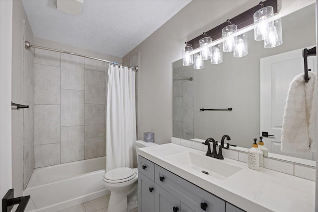 619 W Persimmon Ln, Spokane, WA 99224 - full bathroom with shower / tub combo, toilet, tile patterned flooring, and vanity