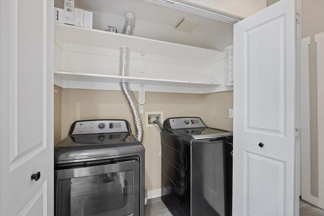 619 W Persimmon Ln, Spokane, WA 99224 - laundry room with washer and dryer and laundry area
