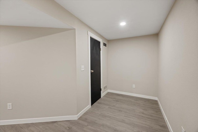 619 W Persimmon Ln, Spokane, WA 99224 - unfurnished room featuring visible vents, baseboards, recessed lighting, and light wood-style floors