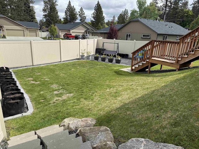 7407 E Beverly Ave, Spokane Valley, WA 99212 - view of yard featuring stairway and a deck
