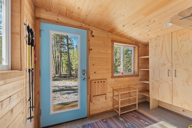 4167 Grouse Creek Rd, Loon Lake, WA 99148 - doorway to outside with wooden ceiling, wood finished floors, wood walls, and lofted ceiling