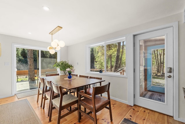 4167 Grouse Creek Rd, Loon Lake, WA 99148 - dining area with a wealth of natural light, recessed lighting, light wood finished floors, and baseboards