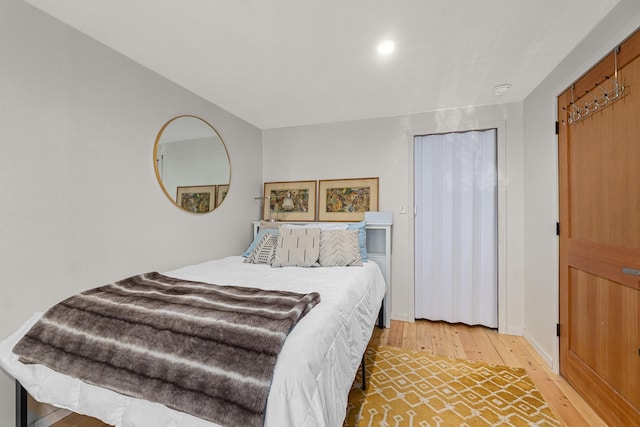 4167 Grouse Creek Rd, Loon Lake, WA 99148 - bedroom featuring light wood-type flooring