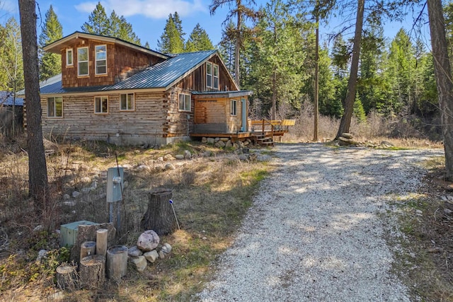 4167 Grouse Creek Rd, Loon Lake, WA 99148 - view of side of property with metal roof