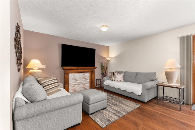 5905 W Excell Ave, Spokane, WA 99208 - living area with a textured ceiling and wood finished floors