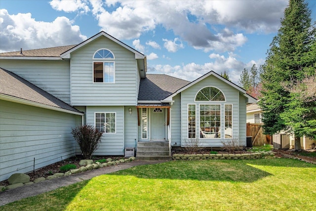 5905 W Excell Ave, Spokane, WA 99208 - view of front of property featuring a front yard, fence, and a shingled roof