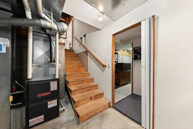 5905 W Excell Ave, Spokane, WA 99208 - staircase featuring unfinished concrete floors