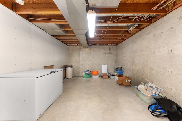 5905 W Excell Ave, Spokane, WA 99208 - unfinished below grade area featuring fridge
