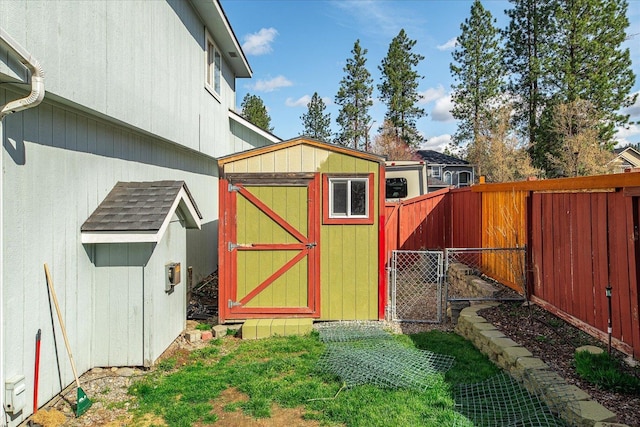 5905 W Excell Ave, Spokane, WA 99208 - view of shed with a fenced backyard and a gate