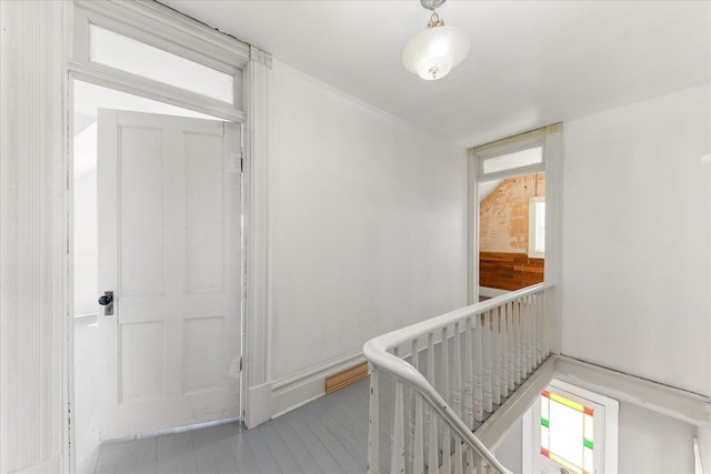 corridor with an upstairs landing
