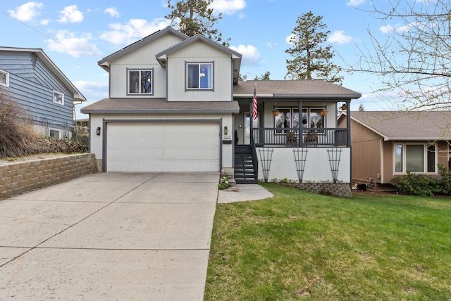 tri-level home featuring roof with shingles, driveway, an attached garage, a front lawn, and a porch