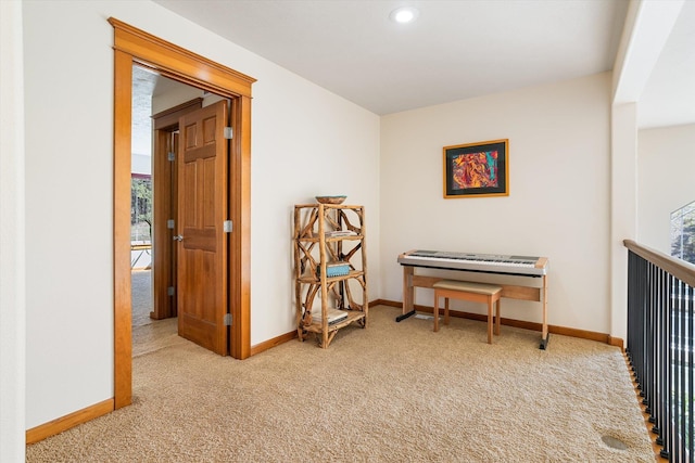 corridor featuring baseboards, recessed lighting, carpet, and a healthy amount of sunlight