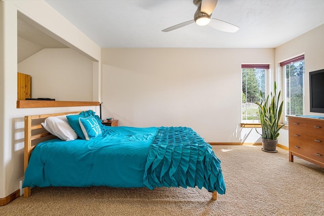 bedroom with baseboards, a ceiling fan, and carpet floors