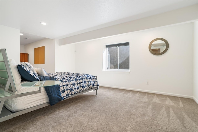 bedroom with recessed lighting, baseboards, and carpet floors
