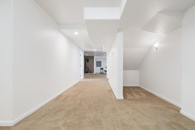 bonus room with recessed lighting, carpet flooring, and baseboards
