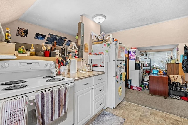 723 W Montgomery Ave, Spokane, WA 99205 - kitchen featuring white appliances, white cabinets, light countertops, and a textured ceiling