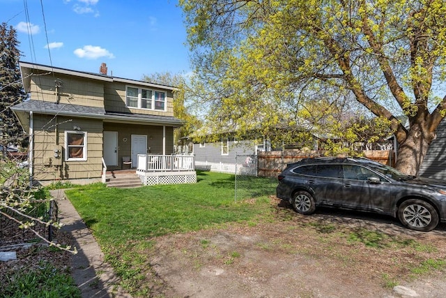723 W Montgomery Ave, Spokane, WA 99205 - rear view of property with a porch and a chimney