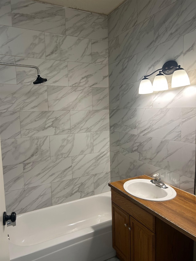 bathroom with vanity and bathing tub / shower combination