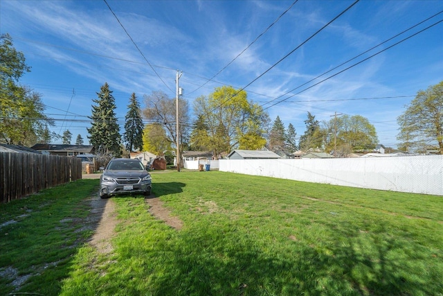 view of yard with fence