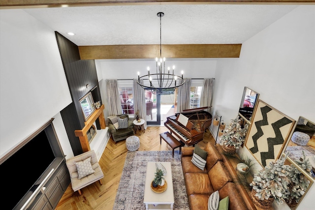 living room featuring beamed ceiling and a notable chandelier