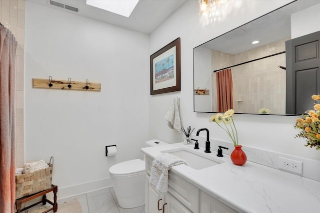 full bath featuring visible vents, toilet, a skylight, marble finish floor, and baseboards