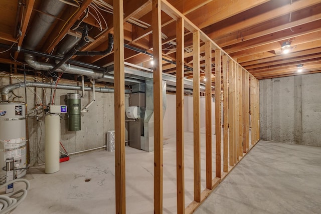 unfinished below grade area with strapped water heater and heating unit