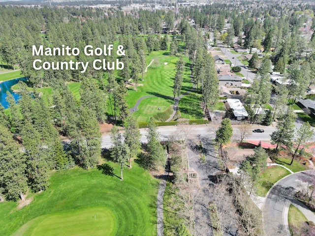 birds eye view of property with a water view, golf course view, and a residential view