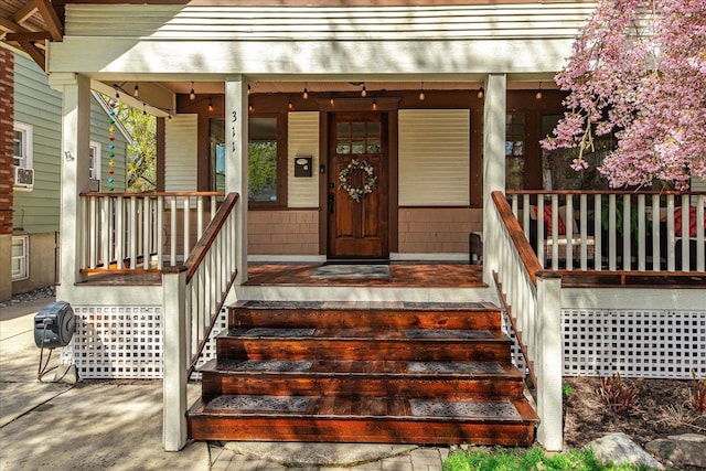 entrance to property with a porch