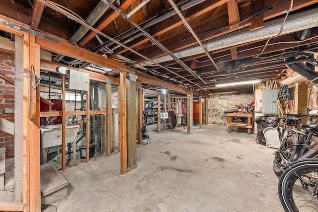 unfinished below grade area featuring electric panel