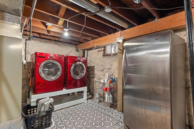 washroom with washer and dryer and laundry area
