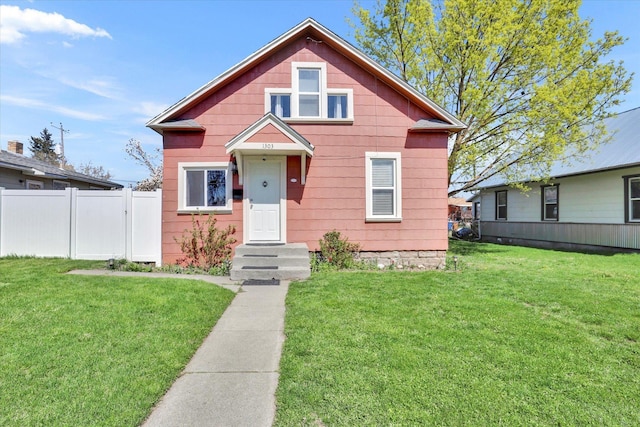 1303 E Rich Ave, Spokane, WA 99207 - bungalow-style house with fence and a front yard