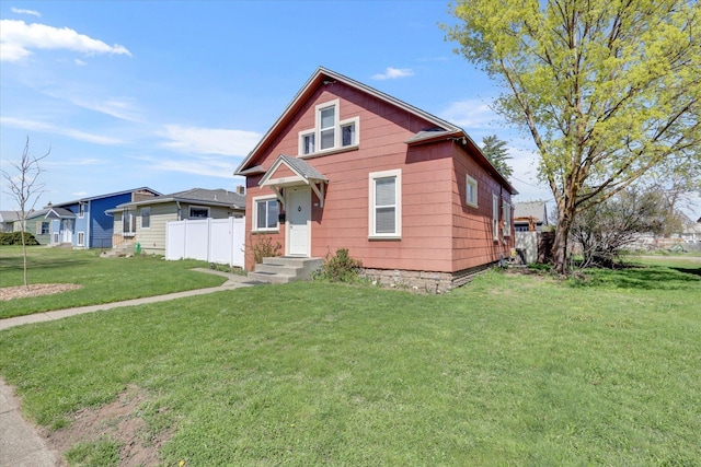1303 E Rich Ave, Spokane, WA 99207 - view of front of house featuring fence and a front yard