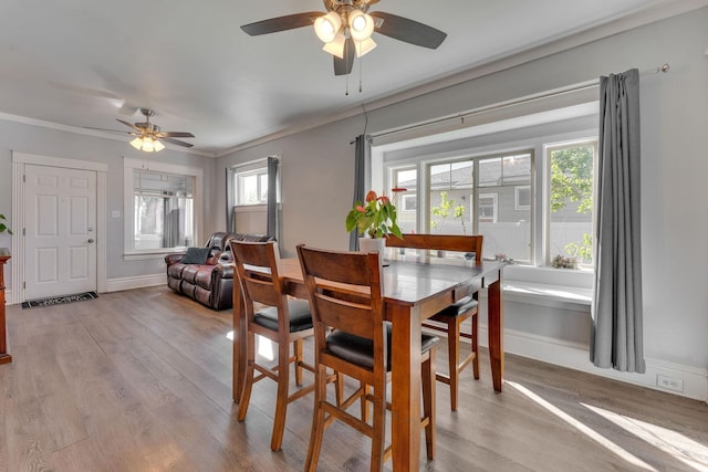 1303 E Rich Ave, Spokane, WA 99207 - dining area featuring plenty of natural light, light wood-style floors, and ceiling fan