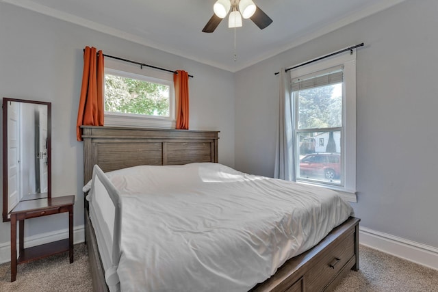 1303 E Rich Ave, Spokane, WA 99207 - bedroom with carpet flooring, baseboards, and a ceiling fan