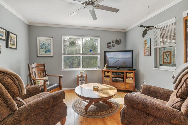 6901 W Depot Springs Rd, Cheney, WA 99004 - living room featuring ornamental molding, baseboards, a ceiling fan, and wood finished floors
