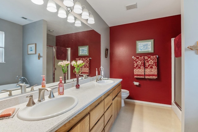 6901 W Depot Springs Rd, Cheney, WA 99004 - bathroom with visible vents, a sink, a shower stall, and double vanity