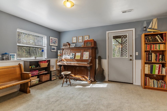 6901 W Depot Springs Rd, Cheney, WA 99004 - sitting room featuring a wainscoted wall, visible vents, and carpet